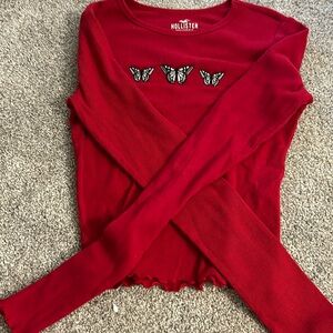 Red with butterfly’s women’s holister top size extra small